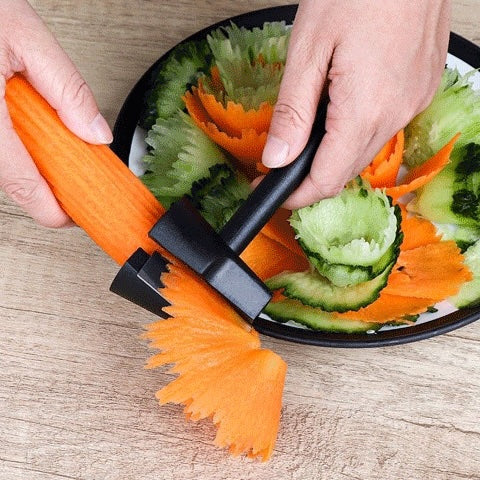 coupe légumes manuel lame dentelée 