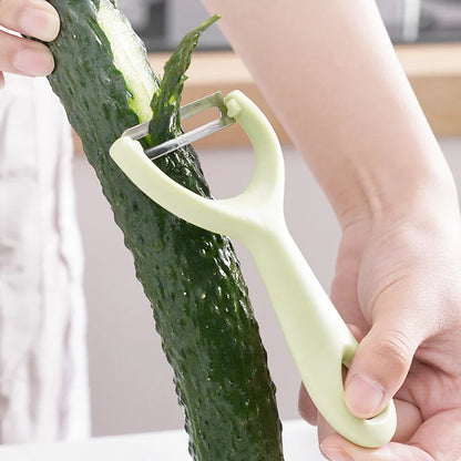 éplucheur à légumes vert