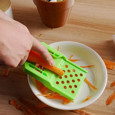 éplucheur à légumes verte