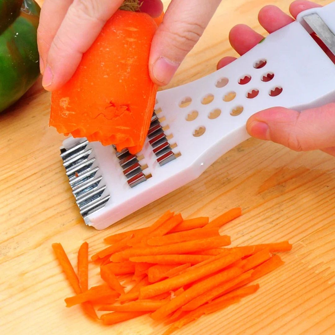 râpe_à_légumes_manuelle_blanche